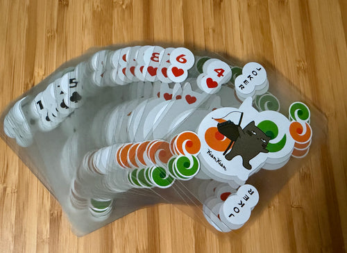 Cute cartoon playing cards included in beach mat set