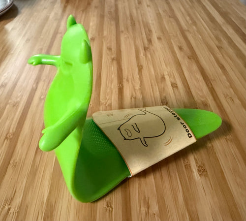 Green Halloween Ghost Door Stopper - side view showing door stopper function
