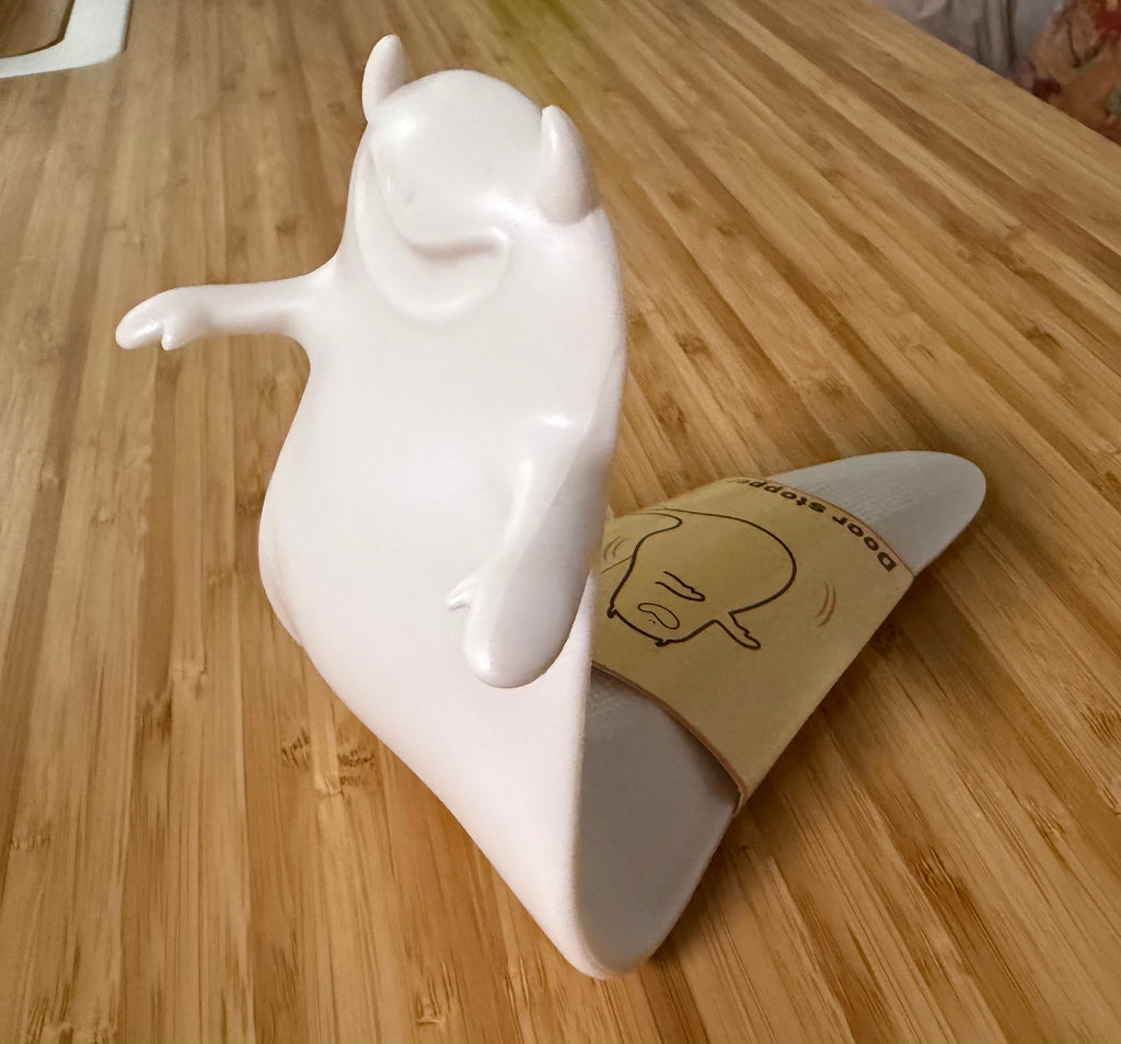 White Halloween Ghost Door Stopper - side view showing door stopper function